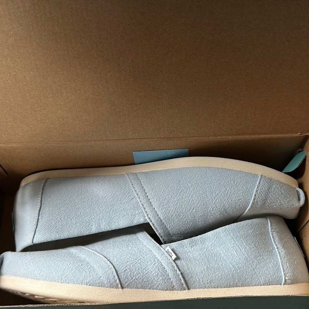 Toms Slip ons, run small